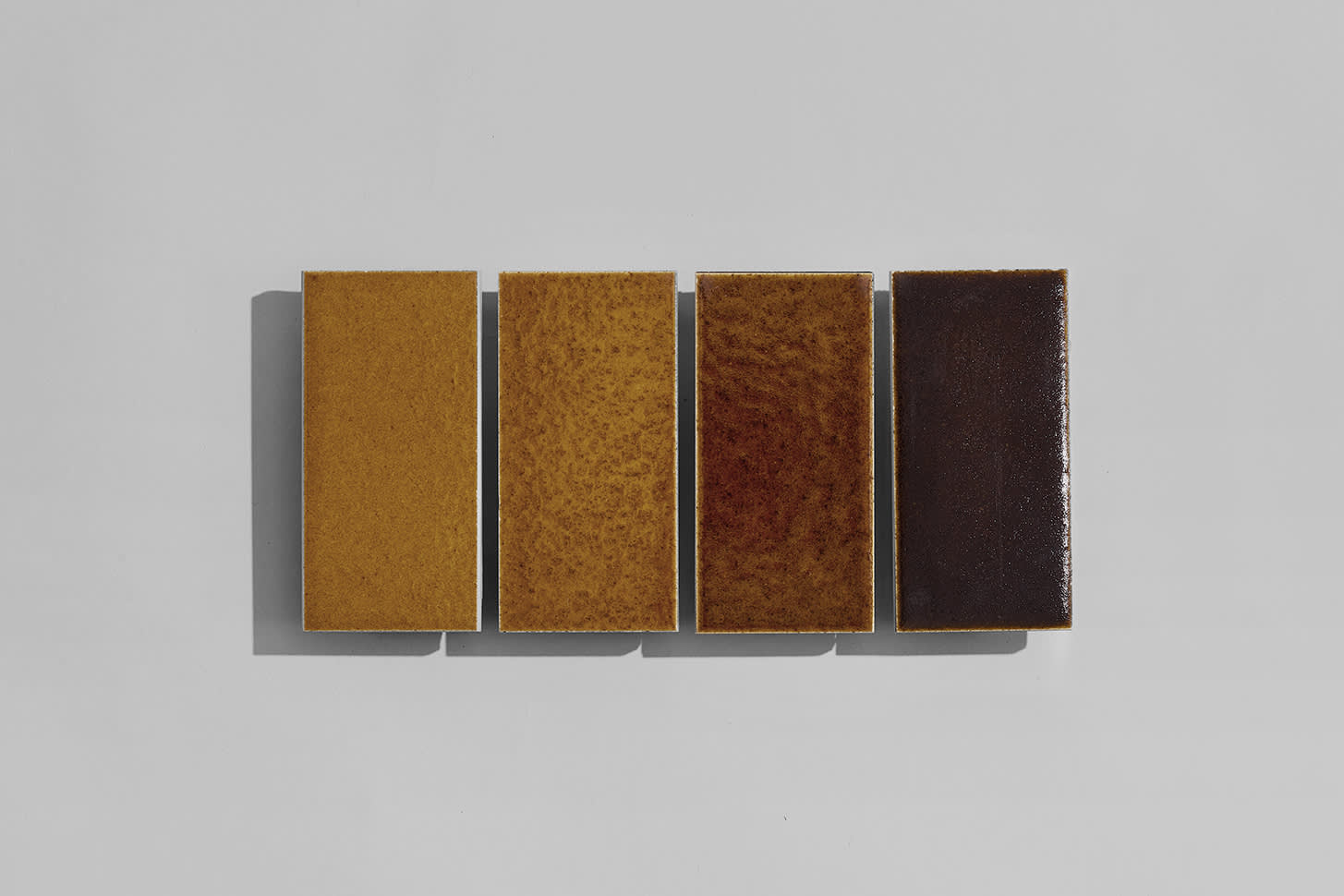 EXCINERE TERRA IN THE 98 ✕ 48MM FORMAT, GLAZES A, B, C, D.